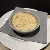 Vegan parmesan served with the pasta   at La Cucina in Soelden
