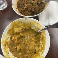Veggie Korma (yellow dish) and Baingan bharta (brown dish)  at City of Spice in Phoenix