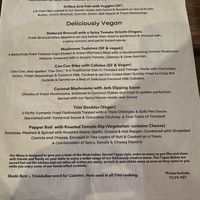 Menu. The trini doubles are confirmed vegan per the server.  at Shado Beni Caribbean Tapas Lounge in Caye Caulker