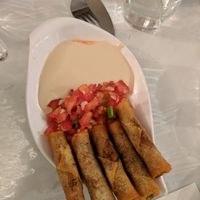 Homemade cigars filled with mushrooms and potatoes  at Zakaim - Vegan Boutique in Tel Aviv