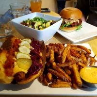 Hotdog, spicy black bean burger, and poutine at Lola Rosa - Parc in Montreal