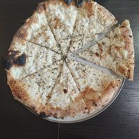 Pizzetta with garlic, rosemary and vegan cheese at La Cucina Italian  in Rustington