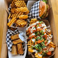 Waffle fries, single burger, egg rolls and Buffalo chicken at Planet Vegan in Fresno