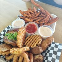 Try out platter with sweet potato fries and three vegan sauces. at Planet Vegan in Fresno