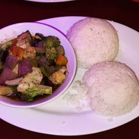 Belezian jerk veggies with double rice   at Enjoy Lounge & Restaurant in Caye Caulker