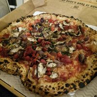 Tomato pizza, vegan cheese, mushrooms, onions, cherry tomatoes, chillis, cherry tomatoes. Delicious. at Rudy's Pizza Napoletana - Castle St in Liverpool