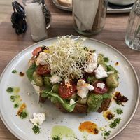 Pesto butter beans with vegan feta added for 1 euro extra.   at Koek van Nouk in Arnhem