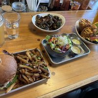 Cluckin’ good chick’n sandwich, brussel sprouts, chimichanga, and a side salad. Amazing!!!  at The Smokin' Onion in Asheville