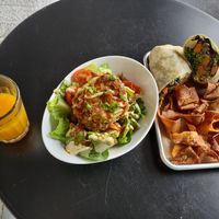 I got the Johnny Utah, the friend green tomatoes, bacun, & Goya peach juice. The Goya peach juice was great! at The Smokin' Onion in Asheville