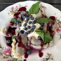 Blueberry dumplings with sour cream at Vegan Friends Kitchen in Warsaw