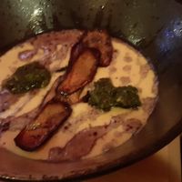 Green and gold: cheesy grits with mushrooms at Moko   in North London