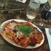 Meatball Parmigiana: gluten-free rigatoni with vegan meatballs, marinara sauce and topped with vegan mozzarella at Tufino Pizzeria in Astoria