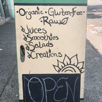 Streetside welcome! at Peace Love and Raw in Olympia