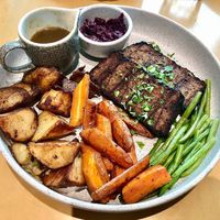 Impossible roast with extra roasties  at The Strand Restaurant in Dubai