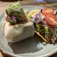 Veggie burrito and veggie tostada (it comes with two tostadas)   at La Patrona Calafell in Calafell