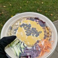 Seasonal pumpkin hummus bowl for take away at Daržo Dubuo in Vilnius