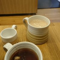 Hot chocolate with oat milk and cup of tea at Five Acres in St Andrews