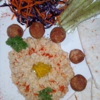 Hummus and falafel with homemade bread and veggies at Bamboo Bar & Vegetarian Restaurant in Sihanoukville