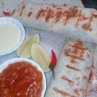 Spicy bean burrito with kidney beans and salsa sauce at Bamboo Bar & Vegetarian Restaurant in Sihanoukville