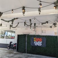 Outdoor covered seating at Guacamole Station in Dania Beach