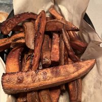 Sweet potato fries with cashew butter sauce  at Bowls by KO in Denver