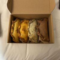 The 4 vegan options - pumpkin, "cheeseburger", vegan tuna, and “chocobanana"  at Las Muns in Porto