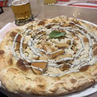 Pizza Toskana  at Pizzeria Dirigì in Lido Di Jesolo