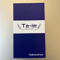 Business card for café  at Ta-im Toranomon in Tokyo