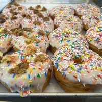 Birthday cake (left), vanilla glazed with sprinkles (right)  at bloomer's in Mississauga