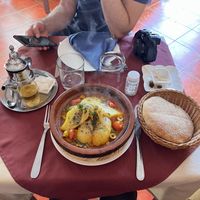 Tagine served with complimentary bread  at Zaytouna in Essaouira