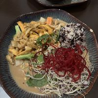 Tofu and seitan in peanut sauce with ricee  at Koko Organic in Prague