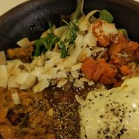 Indian dhal bowl with dhal, brown rice, sweet potatoes, coconut flakes, salad at Glo - Laugavegur in Reykjavik