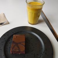 Sweet treat. Raw. Vegan. Gluten-free. Vegan Tumeric milk. at Glo - Laugavegur in Reykjavik