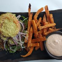 Black bean burger with gluten free bread and sweet potato fries. Vegan and gluten-free. at Glo - Laugavegur in Reykjavik