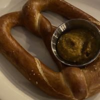 Pretzel with sweet mustard sauce   at The Porch in Santa Margarita