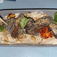 Maduros (ripe plantains) with vegan crema   at Linger in Denver