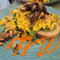 Scrambled Tofu with mushrooms, fresh spinach, and marinated chickpeas at Nourish Wellness Cafe - Pop Life  in Cleveland