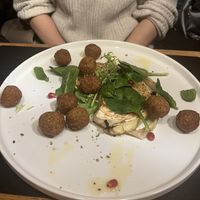 White Cale with falafel like side and Pomegranate  at Vila Vita Burghotel in Dinklage