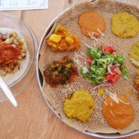 "Binto" - injera tray decorated with 4 dishes at Tenat in Tel Aviv