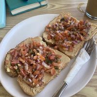 Bruschetta with humous   at Swell Cafe and Bar Pacifico Siargao in Siargao