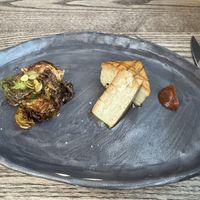 Grilled tofu, Brussels sprouts, smoked date saucee  at 3rd Cousin in San Francisco