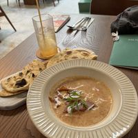 Tomato and Coconut Soup, with bread as a side   at Kommune Lebuh Victoria in Penang