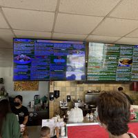 Enormous menu  at El Cantaro Vegan Mexican Restaurant in Monterey