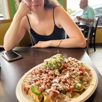 Big nachos! Delicious. Has refried beans, guac, fake sour cream & fake cheese.   at El Cantaro Vegan Mexican Restaurant in Monterey