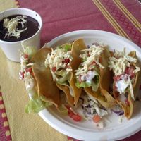 crispy potato tacos and black beans at El Cantaro Vegan Mexican Restaurant in Monterey