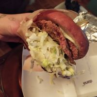 Burger with breaded oyster mushroom at Crusty Kuhna in Ljubljana