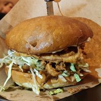 Enoki mushroom burger which is sadly not on the menu. It was only available for one day and it was the best burger ever. Please add it to the menu 🥲 at Crusty Kuhna in Ljubljana
