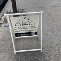 Sign in front (says "Vegan options available") at Cloudy Donut Co - NoLita in New York City