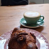 Croisant a la noisete e capuccino at Les Belles Âmes Pâtisserie in Lyon