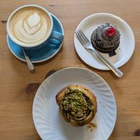 pistacho croissant and black sesame dessert at Les Belles Âmes Pâtisserie in Lyon